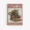 Time spent with books and cats is never wasted poster